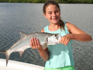 Happy Girl With First Tarpon